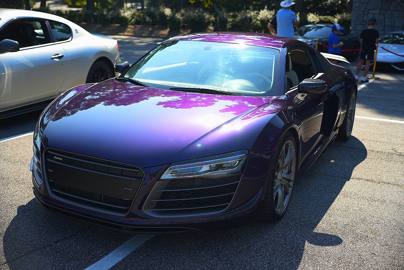 Purple Audi R8 photographed from the front three-quarter angle.
